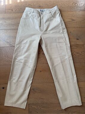 EREZ cream off white leather pants trousers feature a high-waisted, straight-leg